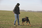 Frau und Rottweiler