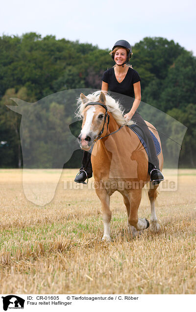 Frau reitet Haflinger / woman rides Haflinger horse / CR-01605