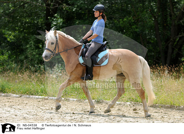 Frau reitet Haflinger / woman rides Haflinger / NS-04538